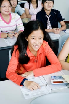 High angle view of teenage students in a classroom