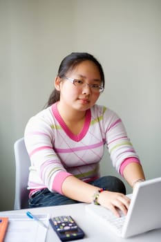 Portrait of a girl using a laptop
