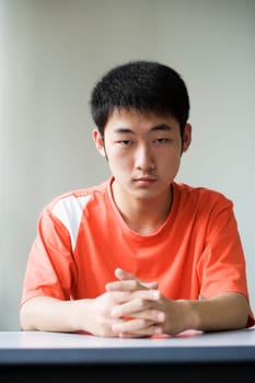 Portrait of a boy looking upset