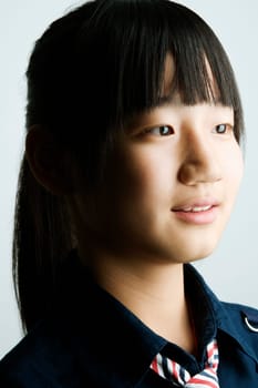 Close-up of a teenage girl smiling