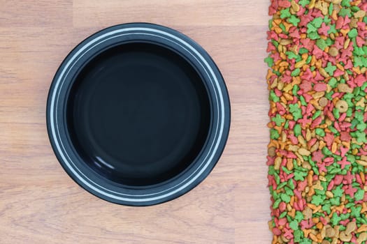 Top view dry food for cat and dog with empty bowl