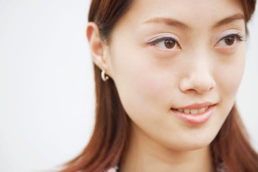 Close-up of a young woman smiling