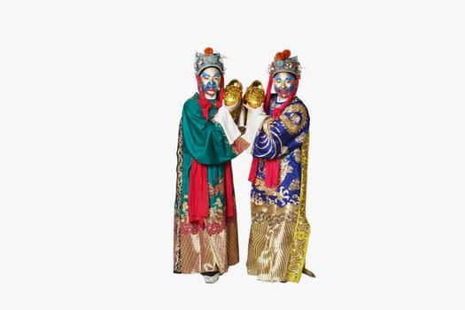 Portrait of two male Chinese opera performers holding bowls full of gold coins