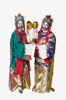 Portrait of two male Chinese opera performers holding bowls full of gold coins