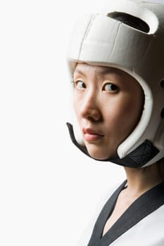 Portrait of a young woman wearing a sports helmet
