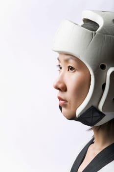 Close-up of a young woman wearing a sports helmet