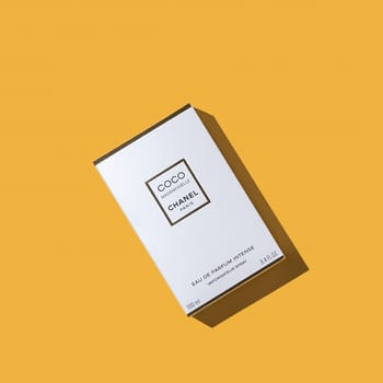 A box of Chanel perfume on a uniform yellow background. Women's perfume series Coco Chanel. 2020-07-05 Samara. Layout, layout, advertising, mockup.