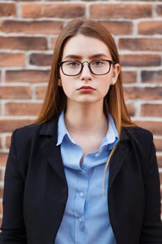 Portrait of beautiful business woman wearing glasses.
