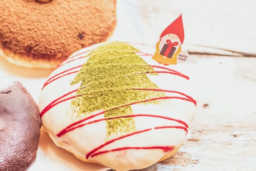 Christmas homemade desserts on table in decorated New Year background