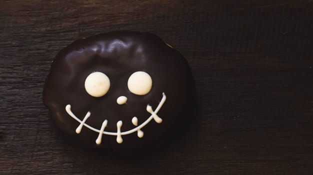 Donut Halloween. Donut on the background. Scary Halloween donut.