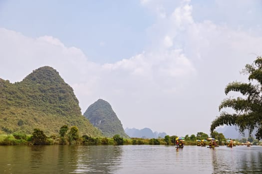 Picturesque mountain valleys of Yangshuo, Guilin, mountain river for rafting 08.23.2019
