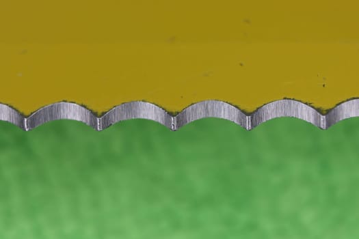 beautiful macro photo of a knife saw colors different abstract background