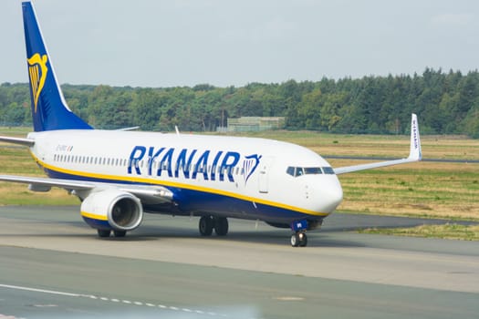 WEEZE, NRW, GERMANY - SEPTEMBER 10, 2018:.Airplane of the airline Ryanair on the runway of Weeze airport.