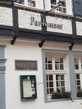 KETTWIG, NRW, GERMANY - FEBRUARY 19, 2019:.Historic and medieval buildings around the Lutherkirche Lutherplatz in Essen Kettwig. Half-timbered houses, some with slate facades.