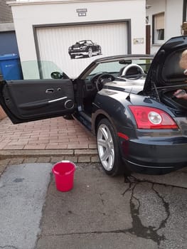 HEILIGENHAUS, NRW, GERMANY - FEBRUARY 26, 2019:.Rear and side view of a Chrysler Crossfire Convertible built between February 2003 and December 2007 by Karmann in Germany.