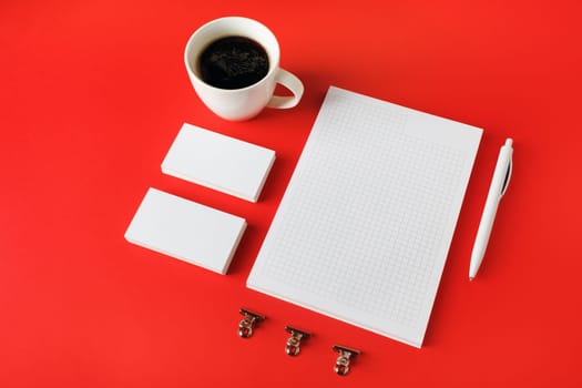 Blank corporate stationery set on red paper background. Template for branding design. Branding mock up.