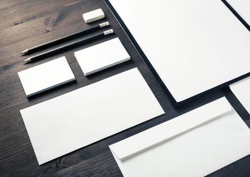 Blank stationery set on wood table background. Template for branding identity. For graphic designers presentations and portfolios.