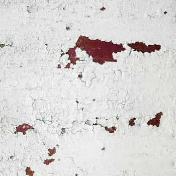 Peeling paint texture. Old grunge background with old peeling paint.