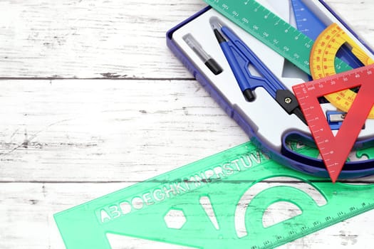 School supplies on a white wooden table