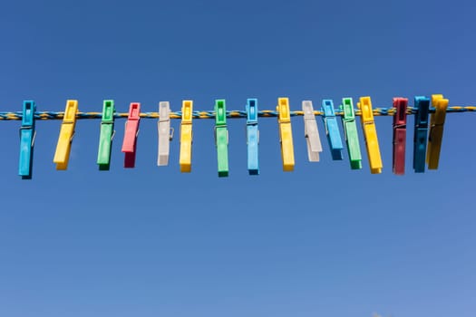 Washing line color pegs domestic closeup essentials items.