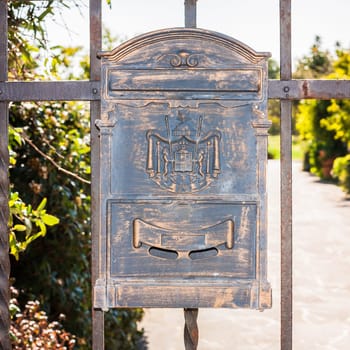Letter box wrought iron with decorations .