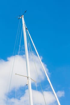 Sailing Must and Blue Sky, Particular of sailing must in a touristic harbor