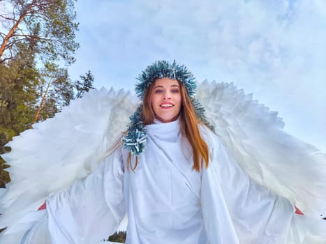 Models in white dresses pose gracefully by the serene lake, embodying a winter wonderland while hinting at the arrival of spring.