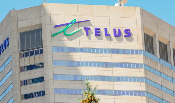 Calgary, Alberta, Canada. Feb 11, 2021. Top of Telus building during day light.