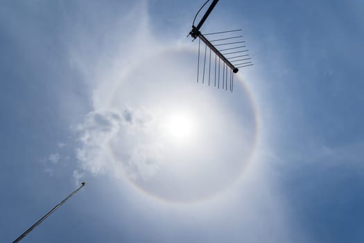 Santa Clara, Cuba. April 03, 2019: A solar halo visible in the sky at 13:23:42 Cuba time