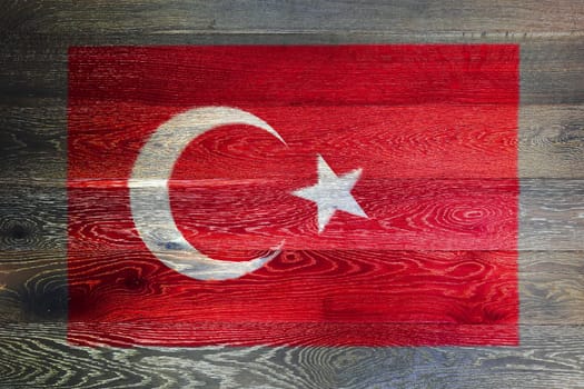 A Turkey flag on rustic old wood surface background