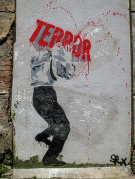 a political graffito on a wall in Spain
