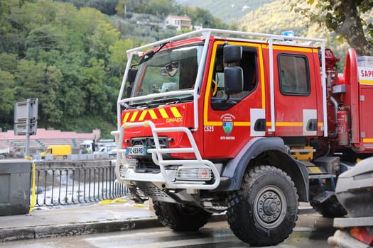Breil-Sur-Roya, France - October 8, 2020: French Renault Gimaex Red Fire Truck Intervention In Breil-Sur-Roya, Town Was Submerged By The Flooding Of The Roya River During Storm Alex, Europe