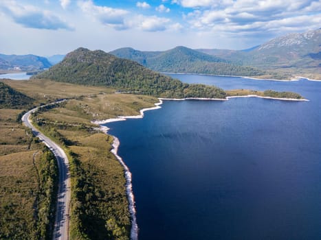 Aerial landscape of Lake Plimsoll on a hot summer's afternoon in Tasmania, Australia