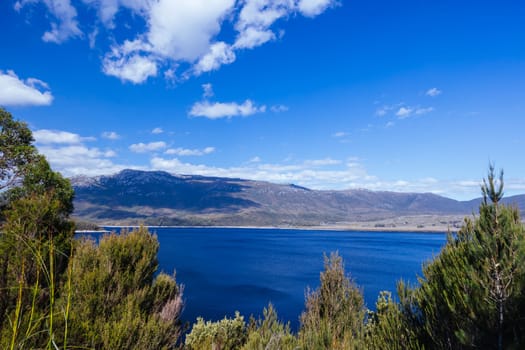 Aerial landscape of Lake Plimsoll on a hot summer's afternoon in Tasmania, Australia