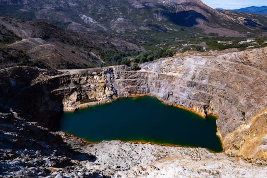 The view of Iron Blow Lookout on a hot summer's afternoon in Queenstown, Tasmania, Australia