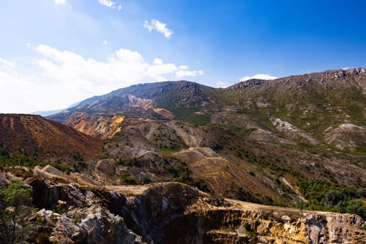 The view of Iron Blow Lookout on a hot summer's afternoon in Queenstown, Tasmania, Australia