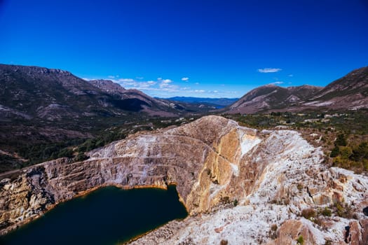 The view of Iron Blow Lookout on a hot summer's afternoon in Queenstown, Tasmania, Australia