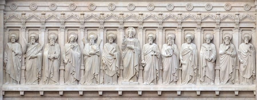 Jesus Christ with Apostles, facade of Saint Augustine church in Paris, France