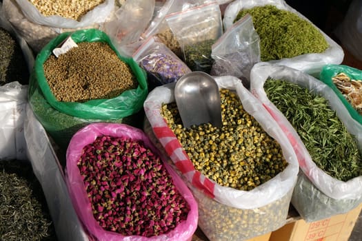 Various types of tea in plastic bags for sale on the Grand Canal, ancient town of Yuehe in Jiaxing, Zhejiang Province, China