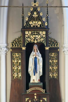 Our Lady of Lourdes altar in the parish church of St. Martin in Dugo Selo, Croatia