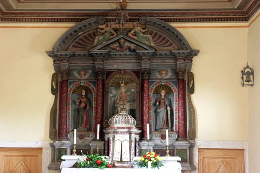 The main altar in the parish church of Our Lady of Mount Carmel in Bacva, Croatia