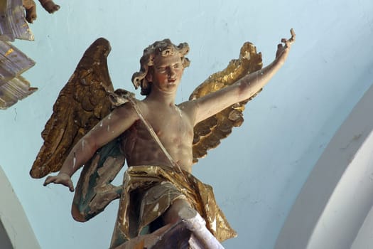 Angel statue on a high altar at Our Lady of Sorrows Chapel in Prepolno, Croatia