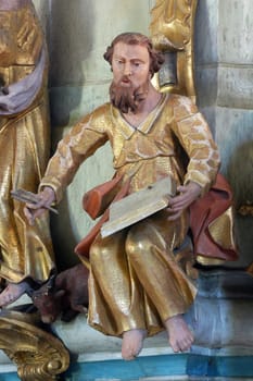 Saint Luke statue at the pulpit in Church of Our Lady of Jerusalem at Trski Vrh in Krapina, Croatia