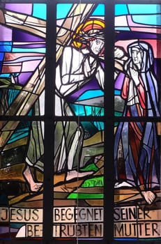 4th Stations of the Cross, Jesus meets His Mother, stained glass window in Saint Lawrence church in Kleinostheim, Germany