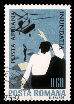Stamp printed in Romania shows Rescue by helicopter, Plight of the Danube flood victims, circa 1970.