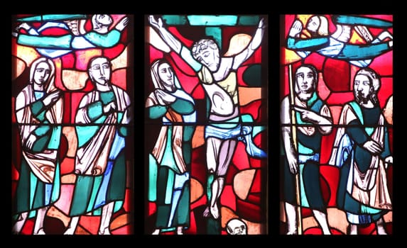 Crucifixion, stained glass window in Basilica of St. Vitus in Ellwangen, Germany