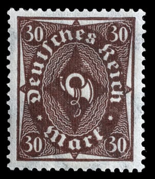 Stamp printed in Germany shows a posthorn, circa 1922.