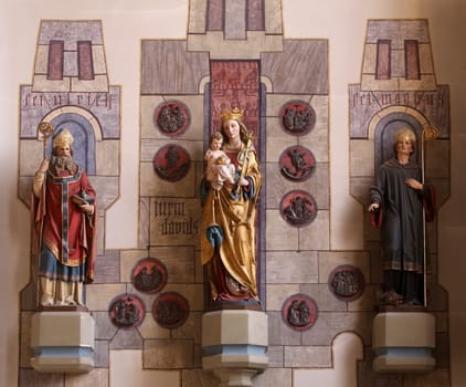 Virgin Mary with baby Jesus and Saints Magnus and Ulrich, the parish church of St. Peter and Paul in Oberstaufen, Germany