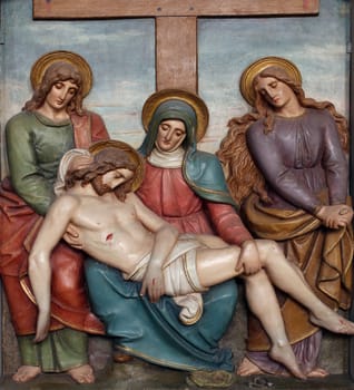 Jesus body is removed from the cross, 13th Stations of the Cross, the parish church of St. Peter and Paul in Oberstaufen, Germany
