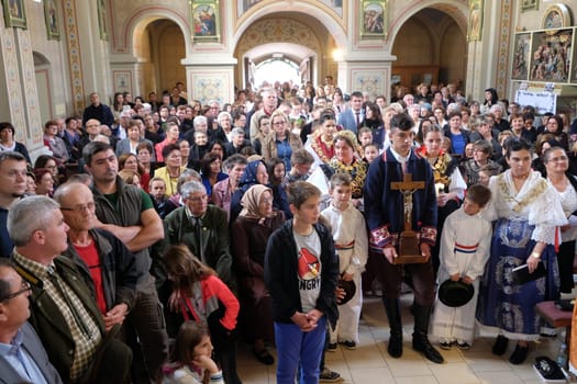 People in the church at the Mass on Thanksgiving day in Stitar, Croatia